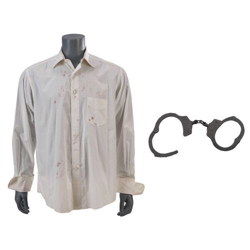 497. President James Marshall's (Harrison Ford) Bloodied Shirt and Nuclear Football Handcuffs ### AIR FORCE ONE (1997)