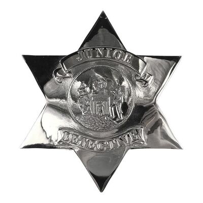 743. The Kid's (Charlie Korsmo) Junior Detective Badge ### DICK TRACY (1990)