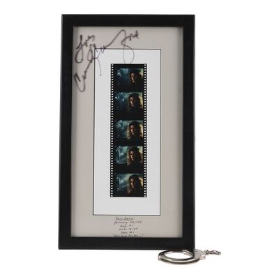 807. Kate McQuean's (Cindy Crawford) Handcuff and Autographed Negatives ### FAIR GAME (1995)