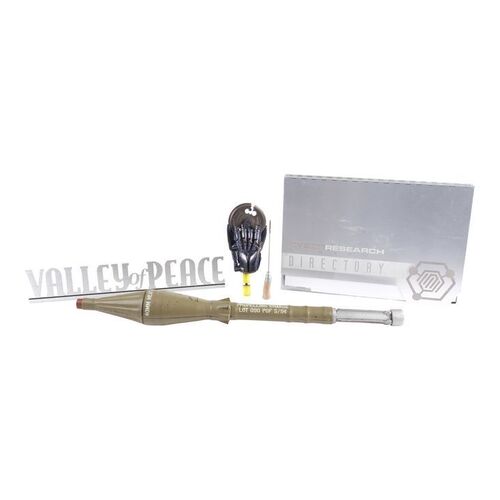 1802. T-X's (Kristanna Loken) Hand Saw with Valley of Peace Sign, Rocket Propelled Grenade, Needle Finger, and Directory Book ### TERMINATOR 3: RISE OF THE MACHINES (2003)