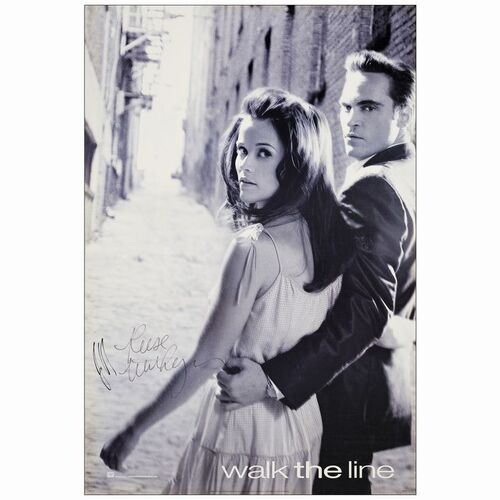 810. One Sheet (27" x 40") Signed by Reese Witherspoon and Joaquin Phoenix (JSA COA); Very Fine Rolled ### WALK THE LINE (2005)