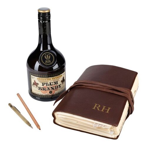 Lot #171: Sir Reginald Hargreeves's (Colm Feore) Journal and Number Five's (Aidan Gallagher) Hotel Obsidian Brandy ### UMBRELLA ACADEMY, THE (2019 - 2024)