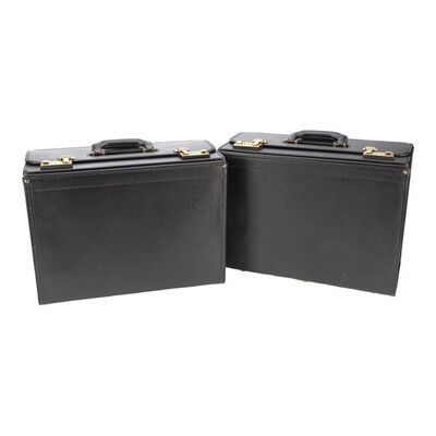 Lot #179: A Pair of Time Traveling Briefcases ### UMBRELLA ACADEMY, THE (2019 - 2024)