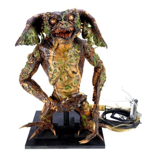 123. Screen-Matched Cable-Controlled SFX Melting Brain Gremlin Puppet ### GREMLINS 2: THE NEW BATCH (1990)