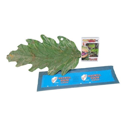 262. Lyle Conway Collection: Full-size Audrey II "Mean Green Mother" Puppet Head Leaf and Growing Plant Coffee Can Label with Conway-autographed Funko Pop! ### LITTLE SHOP OF HORRORS (1986)