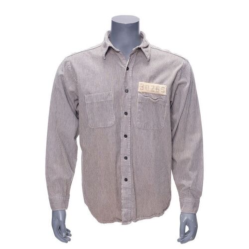 344. Ellis Boyd "Red" Redding's (Morgan Freeman) Prison Shirt ### THE SHAWSHANK REDEMPTION (1994)