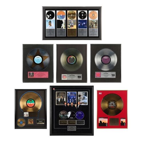 506. Nordoff and Robbins Collection: Seven Assorted Artists Disc Awards ### DAVID MUNNS