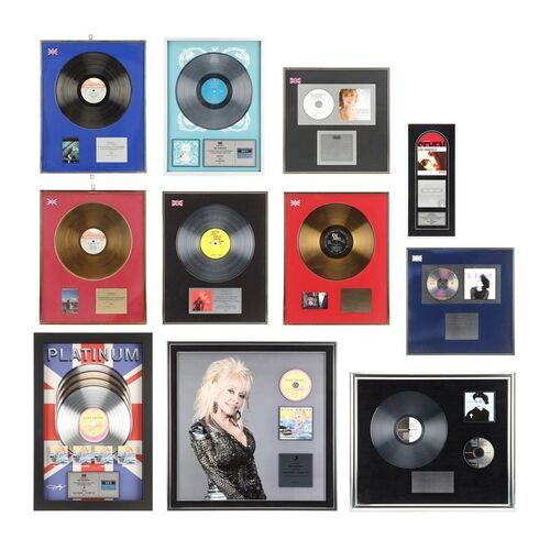 508. Nordoff and Robbins Collection: Eleven Female Artist Disc Awards ### DOLLY PARTON