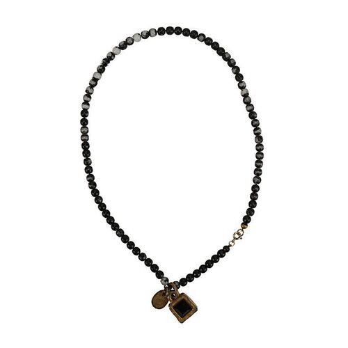 600. The Omer Bhatti Collection: Michael Jackson's Black-beaded Necklace with Stone ### MICHAEL JACKSON