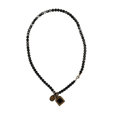 600. The Omer Bhatti Collection: Michael Jackson's Black-beaded Necklace with Stone ### MICHAEL JACKSON
