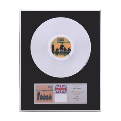 659. "Roll With It" Platinum Disc Presented to Owen Morris ### OASIS