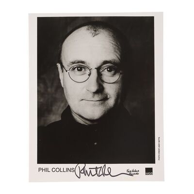 700. Autographed Photo ### PHIL COLLINS