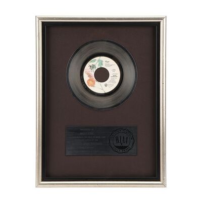 747. The Dr. Fink Collection: "When Doves Cry" Platinum Disc ### PRINCE AND THE REVOLUTION