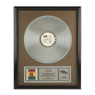 809. "Full Moon Fever" Platinum Disc Presented to Jeff Lynne ### TOM PETTY