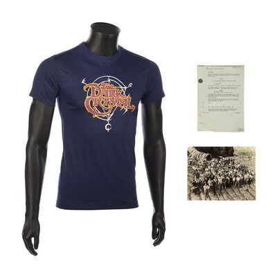 1023. Jim Henson-autographed Crew Photo, Partial Script and Crew Shirt ### THE DARK CRYSTAL (1982)