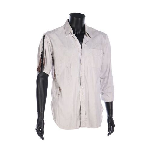1035. Zeus' (Samuel L. Jackson) Bloodied Torn Shirt ### DIE HARD WITH A VENGEANCE (1995)