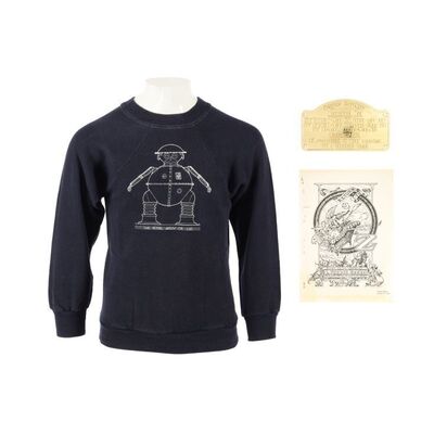 1582. Prototype Tik-Tok Backplate, Script Cover, Crew Jumper and Key Pendant ### RETURN TO OZ (1985)