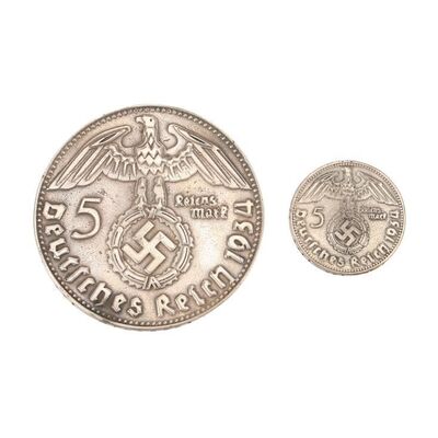 1836. Erik Lehnsherr's (Michael Fassbender) Trick Coin and Close-up Coin ### X-MEN: FIRST CLASS (2011)