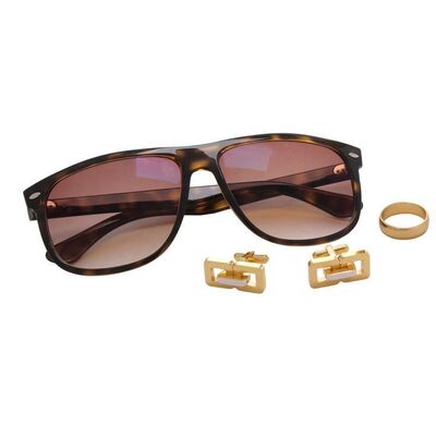 Lot #28: Jordan Belfort's (DiCaprio) Wedding Band, Cufflinks, and Tortoise Ray-Ban Sunglasses ### WOLF OF WALL STREET, THE (2013)