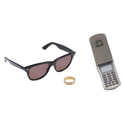 Lot #30: Jordan Belfort's (DiCaprio) Wedding Ring, Ray-Ban Sunglasses, and Cell Phone ### WOLF OF WALL STREET, THE (2013)