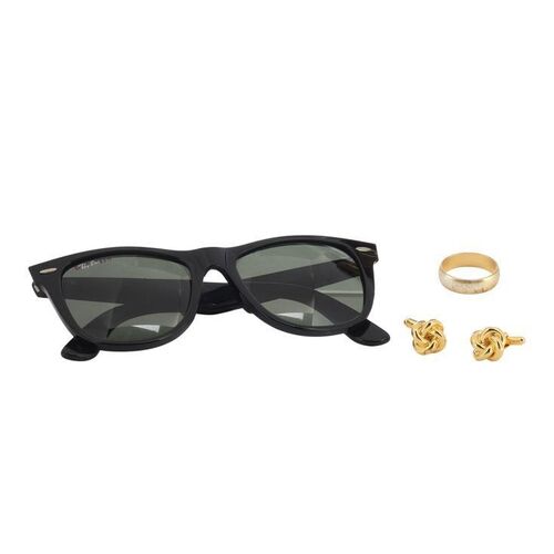Lot #121: Jordan Belfort's (DiCaprio) Wedding Ring, Cufflinks and Ray-Ban Sunglasses ### WOLF OF WALL STREET, THE (2013)