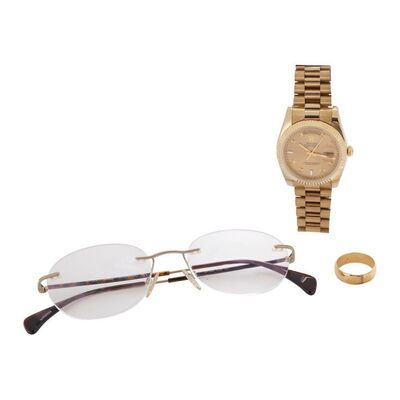 Lot #134: Nicky "Rugrat" Koskoff's (Byrne) Rimless Glasses, Wedding Band, and Faux Rolex Day-Date Watch ### WOLF OF WALL STREET, THE (2013)