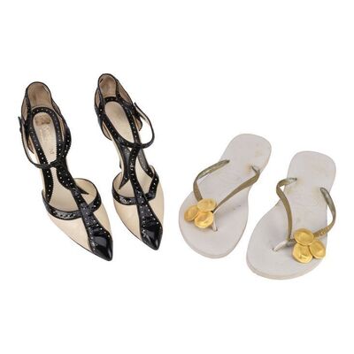 Lot #180: Naomi LaPaglia's (Robbie) Two Pairs of Shoes ### WOLF OF WALL STREET, THE (2013)