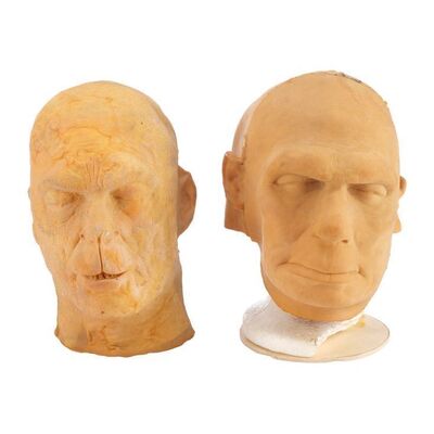 Lot #22: Pair of Production-Made Hominid Caveman Masks ### PRIMEVALS, THE (1970s - 2023)