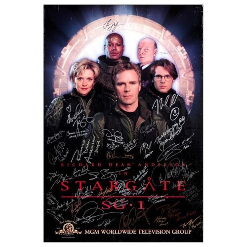 405. Key Cast-Autographed Promotional Poster (27" x 40") Signed by Richard Dean Anderson, Amanda Tapping and 36 more! (JSA COA); Fine- Rolled ### STARGATE SG-1 (1997)