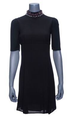 Lot #13: Bradley Jackson's (Reese Witherspoon) Black Prada Dress from Season 2 ### THE MORNING SHOW (2019 - PRESENT)