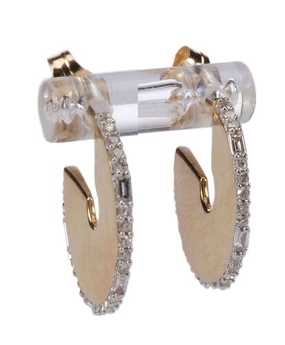 Lot #24: Bradley Jackson's (Reese Witherspoon) Adina Reyter 14k Yellow Gold and Diamond Hoop Earrings ### THE MORNING SHOW (2019 - PRESENT)