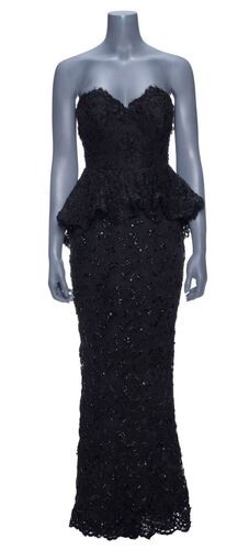 Lot #38: Mindy Kaling's Salvador Perez Black Gown from the 2014 Vanity Fair Oscar's Party ### 2014 VANITY FAIR OSCARS PARTY