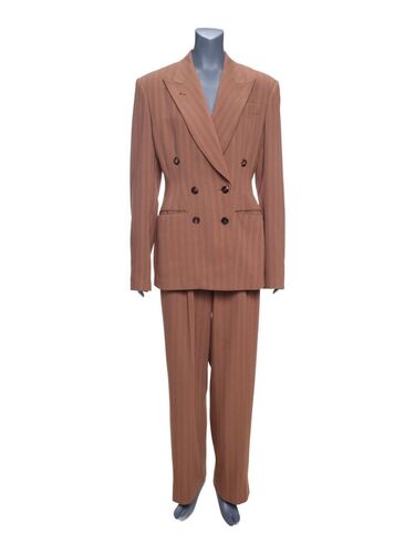 Lot #46: Sydney Ellen Wade's (Annette Bening) Brown Suit from the Annette Bening Collection ### AMERICAN PRESIDENT, THE (1995)