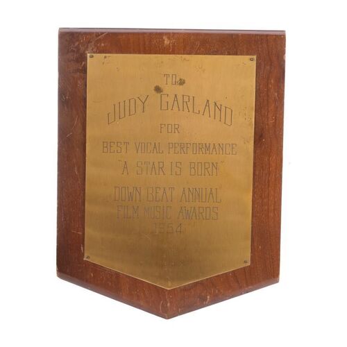 298. Planet Hollywood Collection: Judy Garland's Down Beat Annual Film Music Award for Best Vocal Performance ### STAR IS BORN, A (1954)