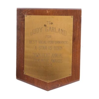 298. Planet Hollywood Collection: Judy Garland's Down Beat Annual Film Music Award for Best Vocal Performance ### STAR IS BORN, A (1954)