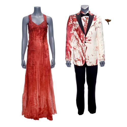 571. Carrie White's (Chloe Grace Moretz) Bloodied Prom Dress with Tommy Ross' (Ansel Elgort) Screen-Matched Bloodied Prom Tuxedo Costume ### CARRIE (2013)