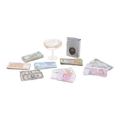 1252. Team America Lighter, Cocktail Glass, and International Currency Model Miniatures ### TEAM AMERICA: WORLD POLICE (2004)