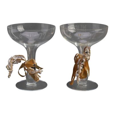 1310. Dino Corelli's (Desi Arnaz, Jr.) and Muffin Brenner's (Amy Stryker) Wedding Glasses ### WEDDING, A (1978)