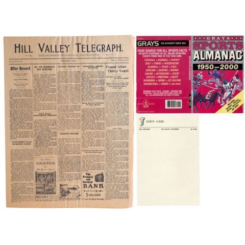 13. Lou's Cafe Letterhead with Production-Made Grays Sports Almanac Cover and Hill Valley Telegraph Newspaper ### BACK TO THE FUTURE TRILOGY (1985-1990)