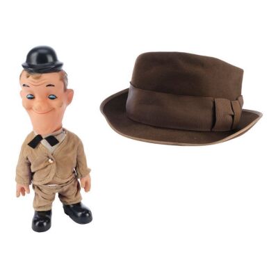 39. Sam's (Johnny Depp) Hat and Stan Laurel Doll ### BENNY & JOON (1993)