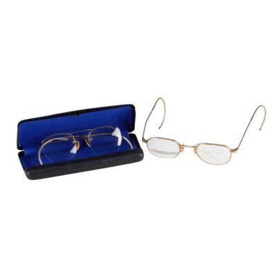 67. Noah Cross' (John Huston) Screen-Matched Broken Glasses with Unbroken Glasses and Case ### CHINATOWN (1974)