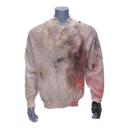 77. Gabe Walker's (Sylvester Stallone) Sweater, Shirt, and Gloves ### CLIFFHANGER (1993)