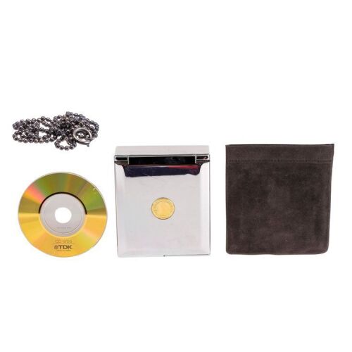 126. U.S. Marshal John Kruger's (Arnold Schwarzenegger) Necklace with Lee Cullen's (Vanessa Williams) Compact Mirror, Mirror Sleeve, and CD-R ### ERASER (1996)