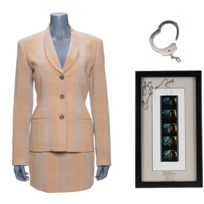 133. Cindy Crawford-Autographed Kate McQuean Costume with Handcuff and Autographed Negatives ### FAIR GAME (1995)