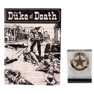 407. W.W. Beauchamp's (Saul Rubinek) "The Duke of Death" Novel Cover with Lucite-Encased Deputy Sheriff Badge Crew Gift ### UNFORGIVEN (1992)