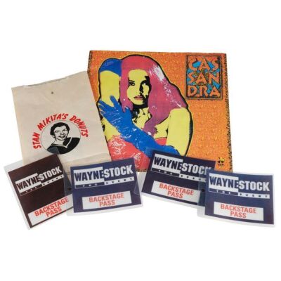416. Stan Mikita's Donuts Bag with Cassandra Wong (Tia Carrere) Flyer and Four "Waynestock" Backstage Passes ### WAYNE'S WORLD 2 (1993)