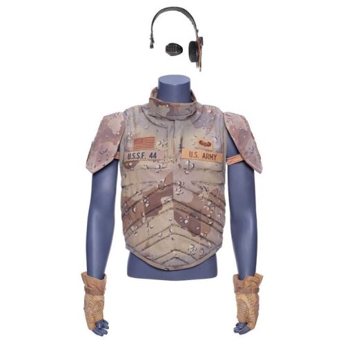 409. GR61's (Simon Rhee) UniSol Vest with Luc Deveraux's (Jean-Claude Van Damme) GR44 Patch and UniSol Costume Components ### UNIVERSAL SOLDIER (1992)