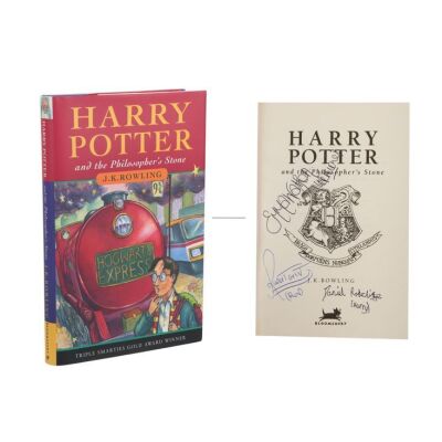 129. Daniel Radcliffe, Emma Watson and Rupert Grint Autographed Book ### HARRY POTTER AND THE PHILOSOPHER'S STONE (2001)