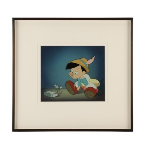 392. Framed Pinocchio and Jiminy Cricket Original Production Cel on Courvoisier Background ### PINOCCHIO (1940)