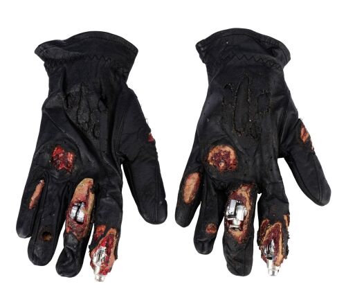 407. Pair of the Terminator's (Arnold Schwarzenegger) Battle-Damaged Right-Hand Gloves with Endoskeleton Fingers ### TERMINATOR 2: JUDGMENT DAY (1991)